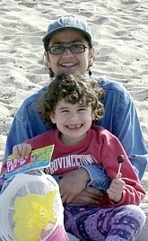 Dominique Ghossein ('76) with daughter Sadie (Provincetown, August 2003)